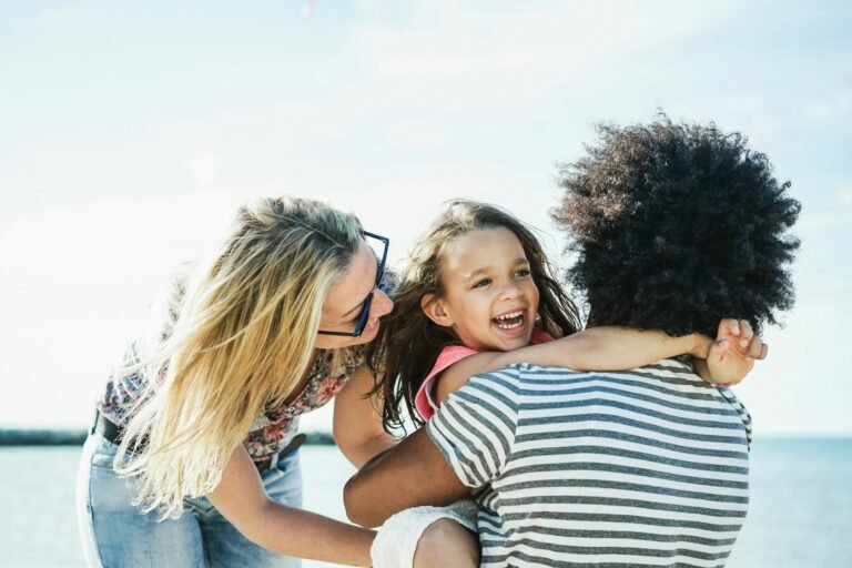 Happy family having fun on the beach